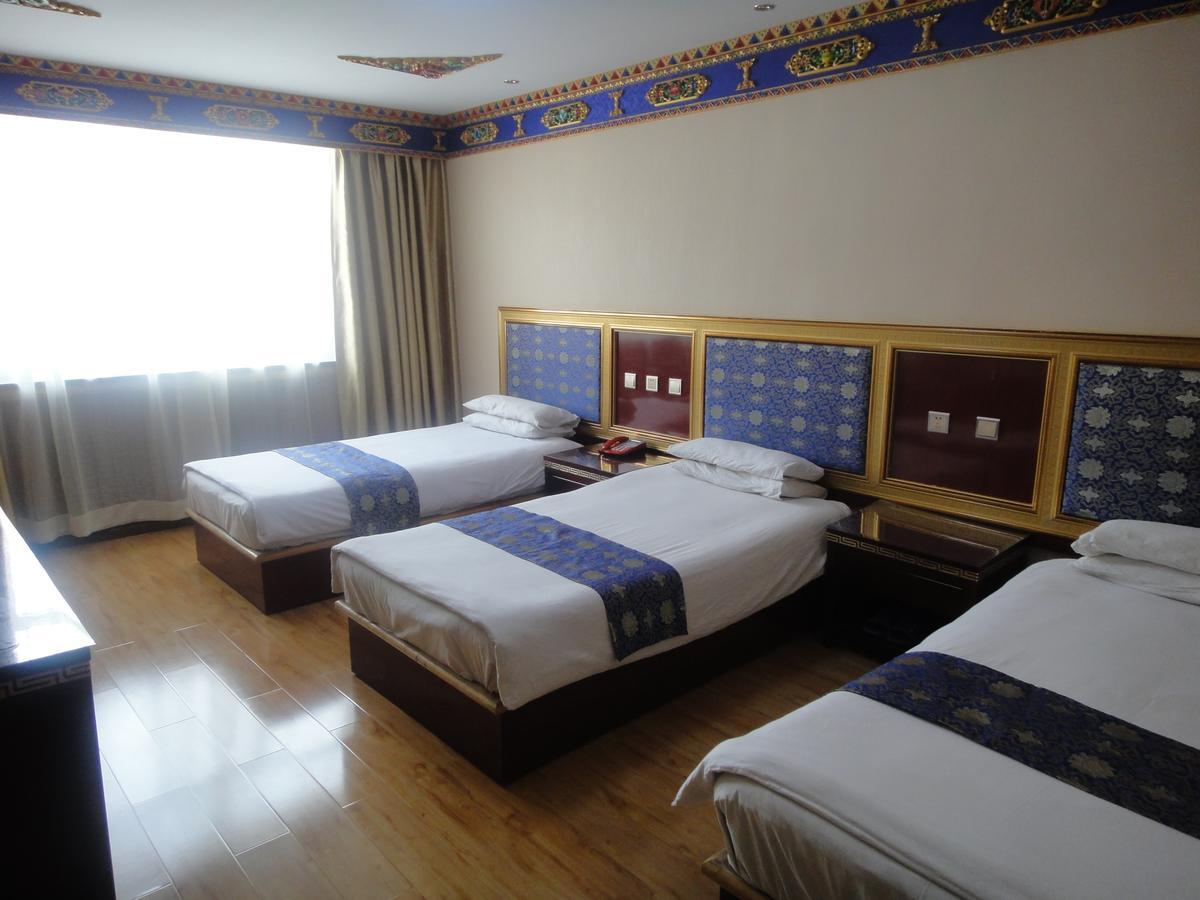 Overseas Tibetan Hotel Сяхэ Экстерьер фото