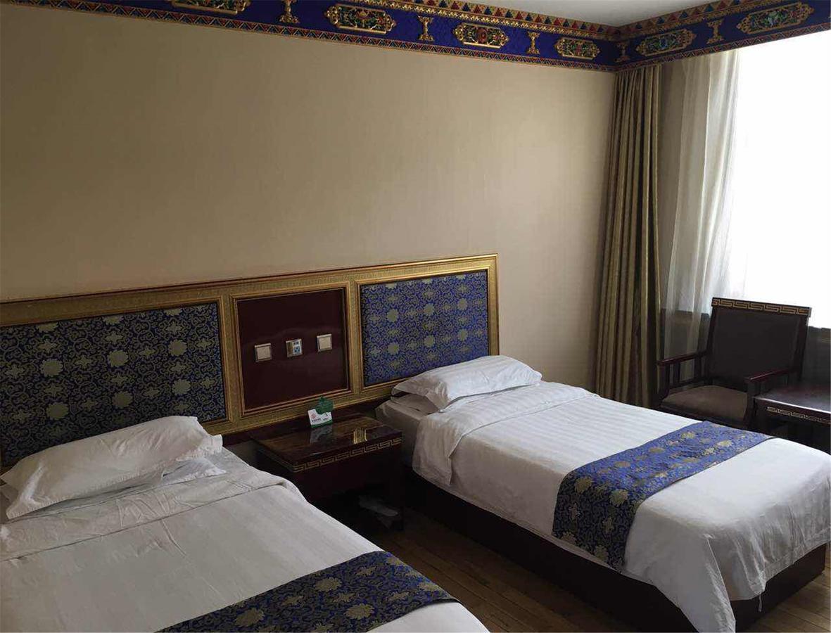 Overseas Tibetan Hotel Сяхэ Экстерьер фото