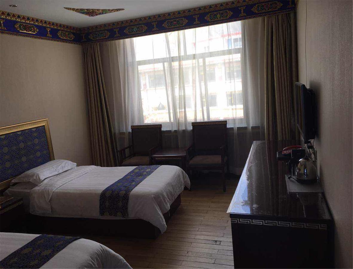 Overseas Tibetan Hotel Сяхэ Экстерьер фото